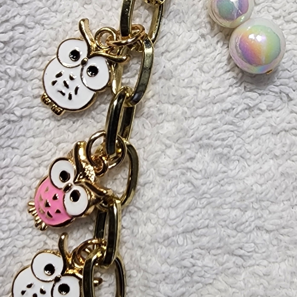 Gold Owl Charm Bracelet with White and Pink Enamel Owls